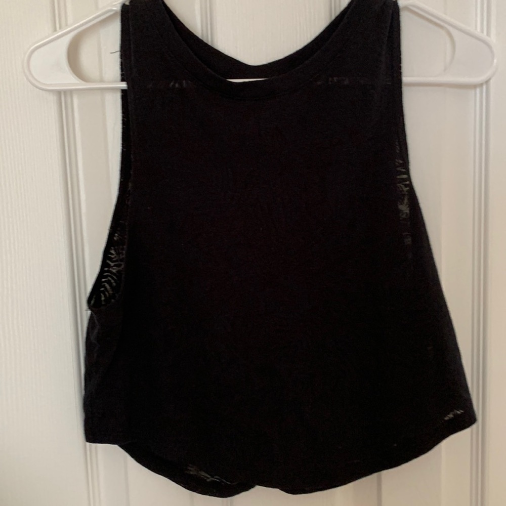 Black tank top, see-through palm design. Made by Live Love Dream. Size small.